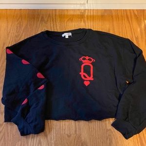 A cropped queen of hearts shirt